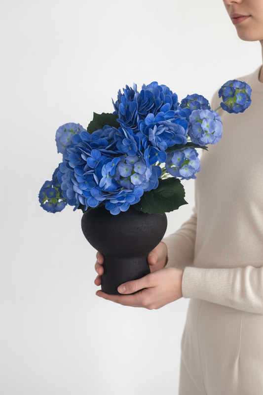 Hands Holding Hydrangea Vase
